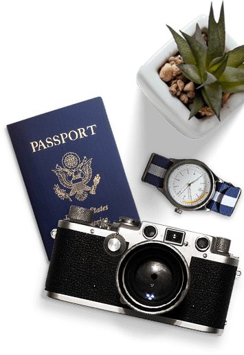 A passport, camera and watch are shown.